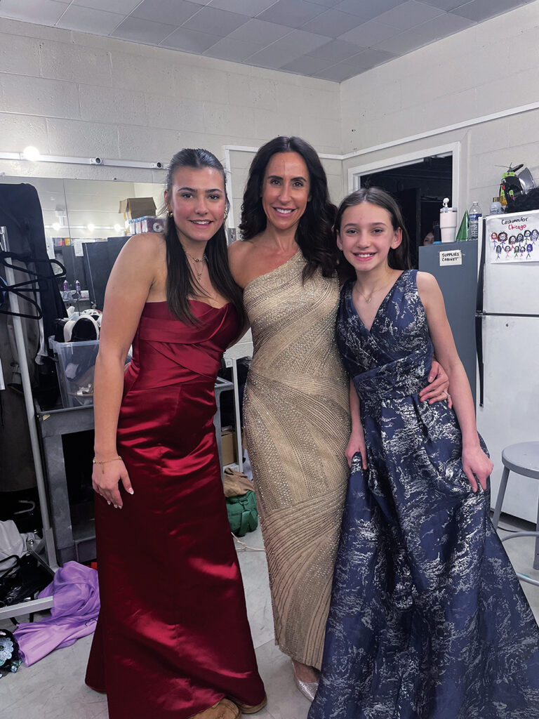 Say Yes to the Dress PHOTO 2 - Maddie, Jen, and Leighton Chillo backstage Maddie, Jen, and Leighton Chillo showcase prom gowns at the “Say Yes to the Dress” fashion show. Left: Donations make Morton West’s “Say Yes to the Dress” prom boutique and fashion show possible.