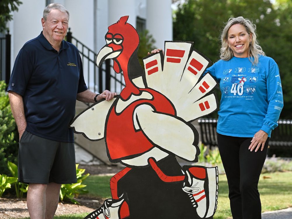 Christine Fogarty and
Dan Gibbons look
forward to hosting
the 42nd annual Dan
Gibbons Turkey Trot in
downtown Elmhurst on
Thanksgiving Day.
<i>Photo by Victor Hilitski</i>