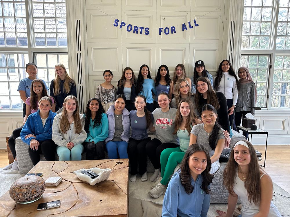 Mia Barakat (bottom row right) and Sofia Malinas (bottom row left) founded Sports for All, which made its first donation this past spring.